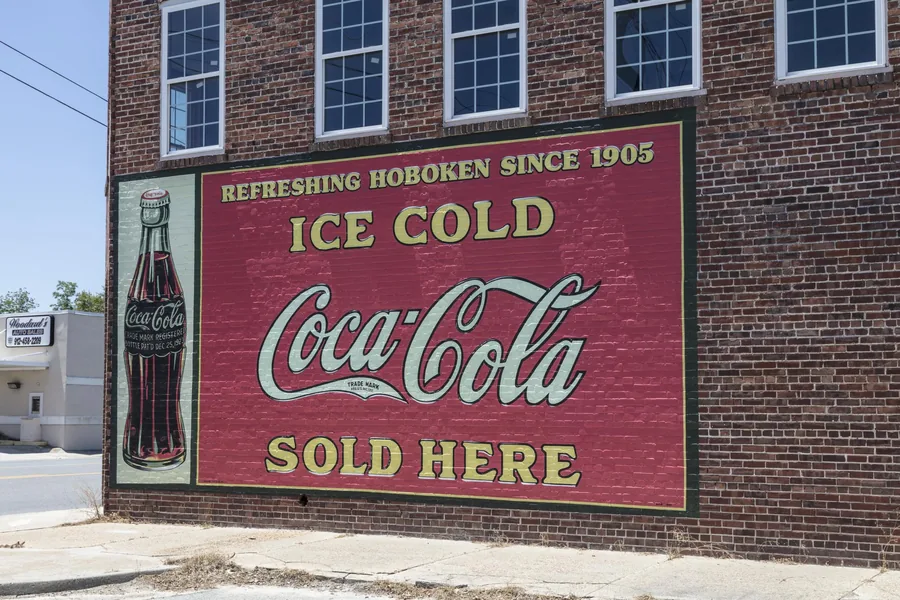 A Coca-Cola wall sign in Hoboken, Georgia carrying the town's own name alongside the brand